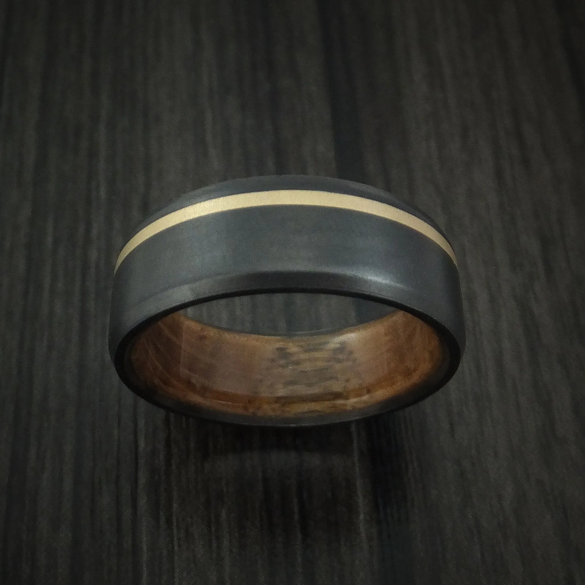 Black Titanium Men's Ring with 14K Yellow Gold Inlay and Hardwood Sleeve