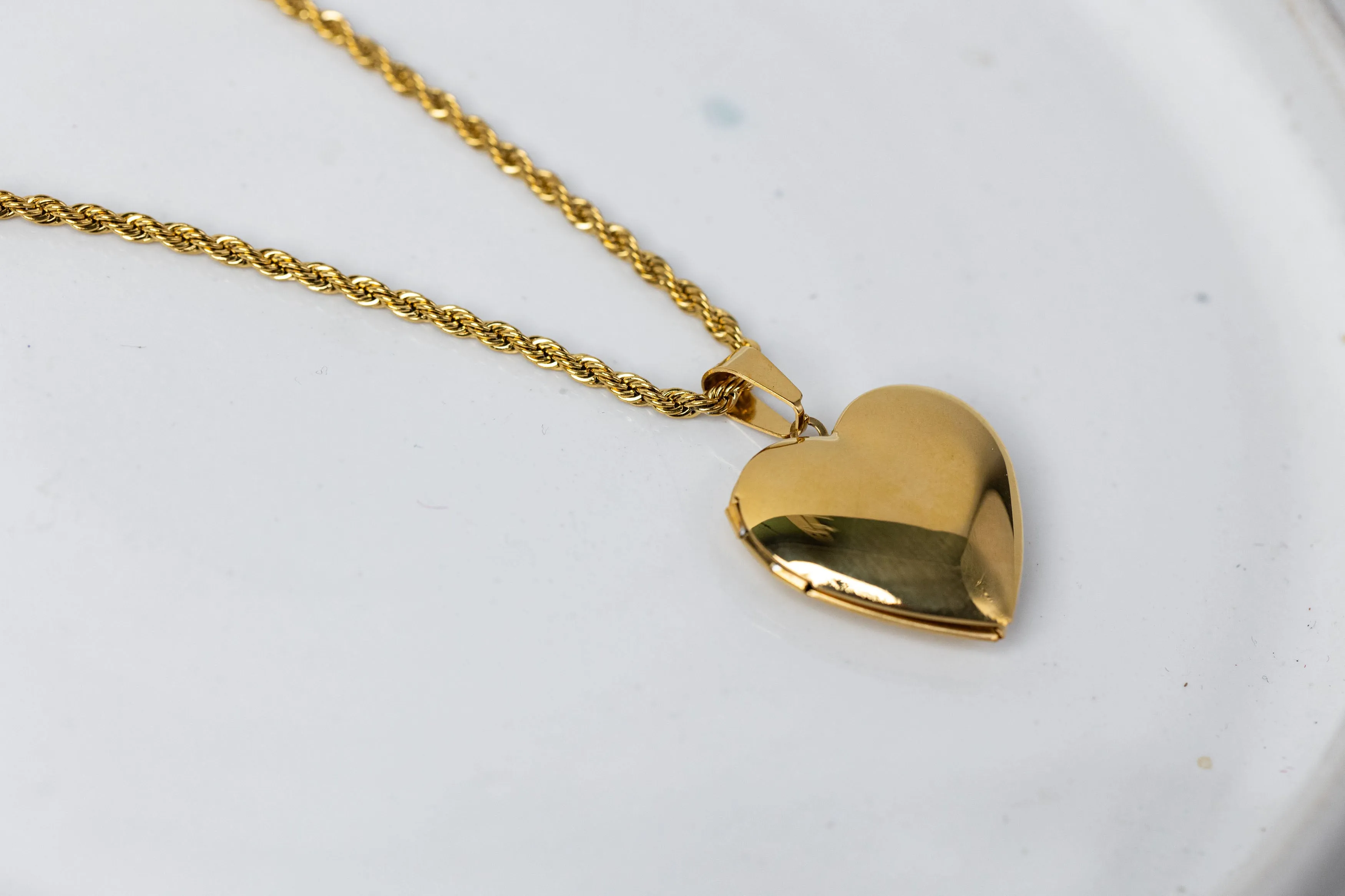 Gold heart locker necklace